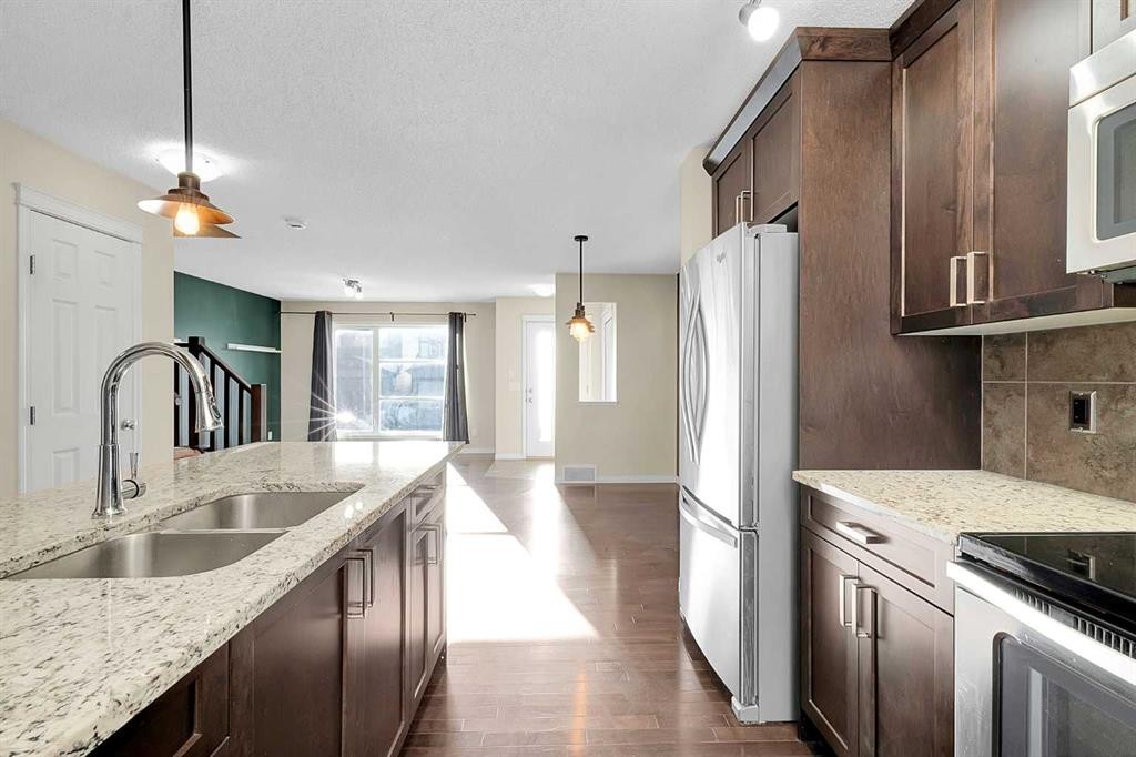 149 Walden Parade Se, Calgary, AB - Indoor Photo Showing Kitchen With Double Sink With Upgraded Kitchen