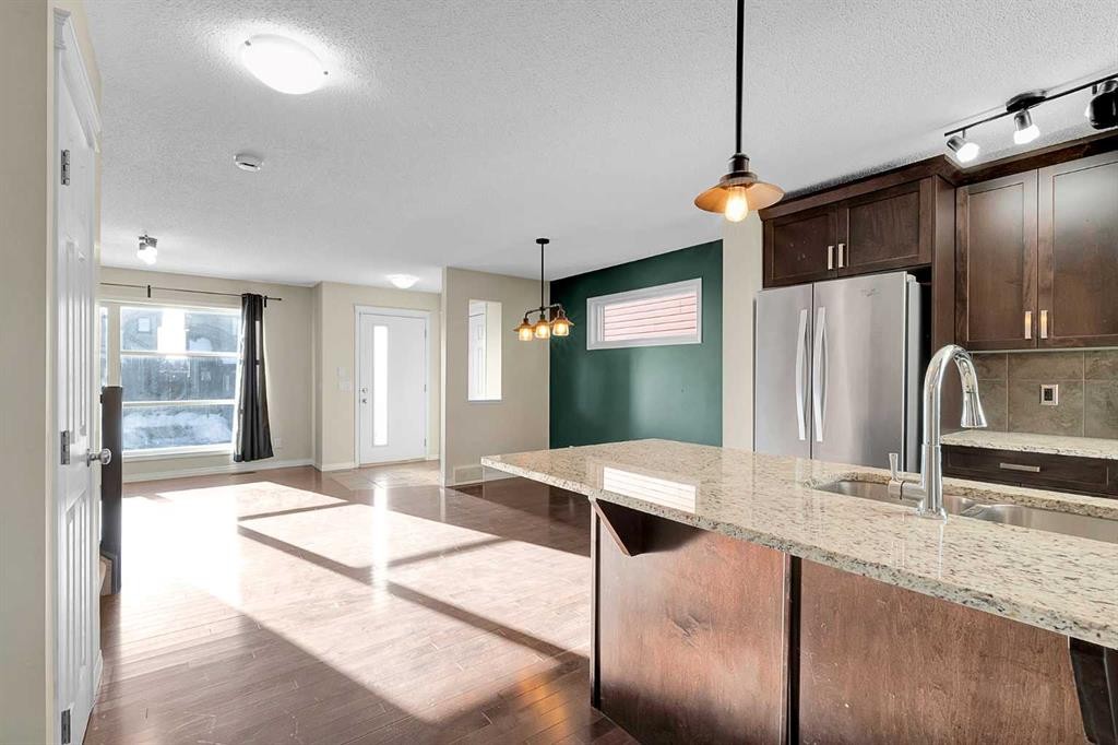 149 Walden Parade Se, Calgary, AB - Indoor Photo Showing Kitchen With Stainless Steel Kitchen With Double Sink With Upgraded Kitchen