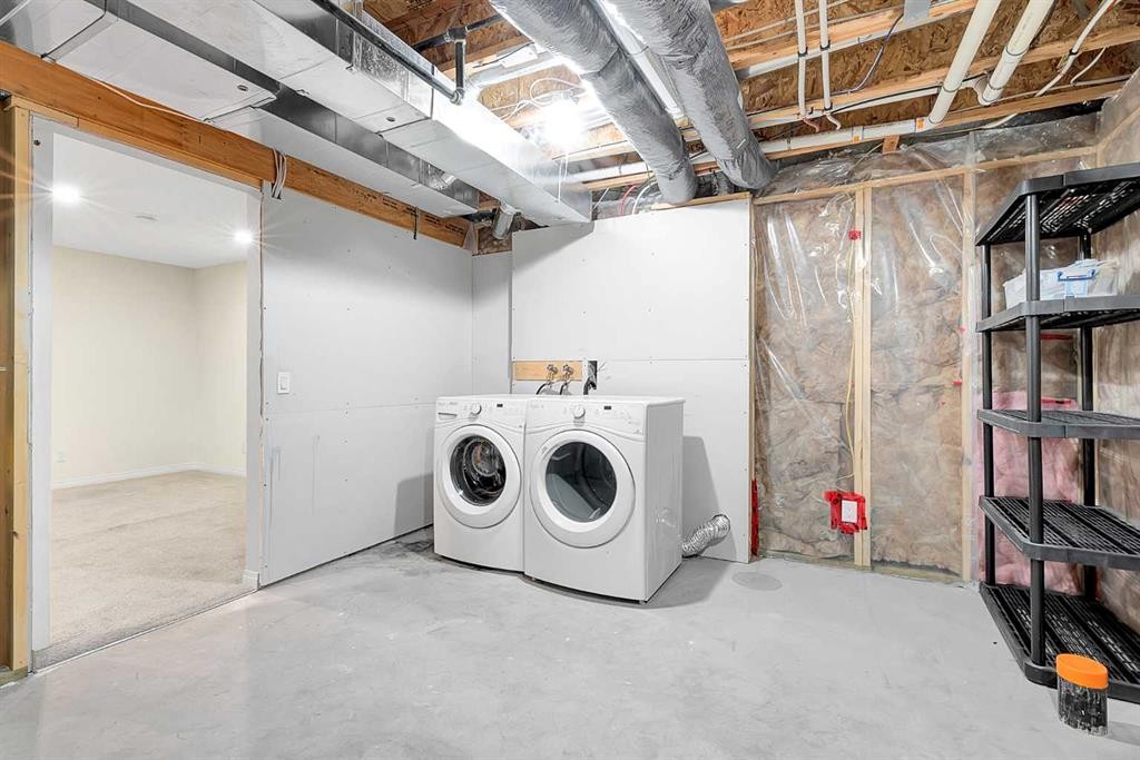 149 Walden Parade Se, Calgary, AB - Indoor Photo Showing Laundry Room