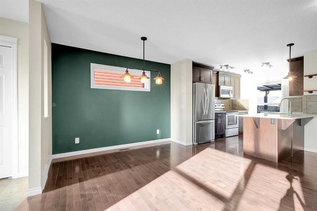 149 Walden Parade Se, Calgary, AB - Indoor Photo Showing Kitchen With Stainless Steel Kitchen