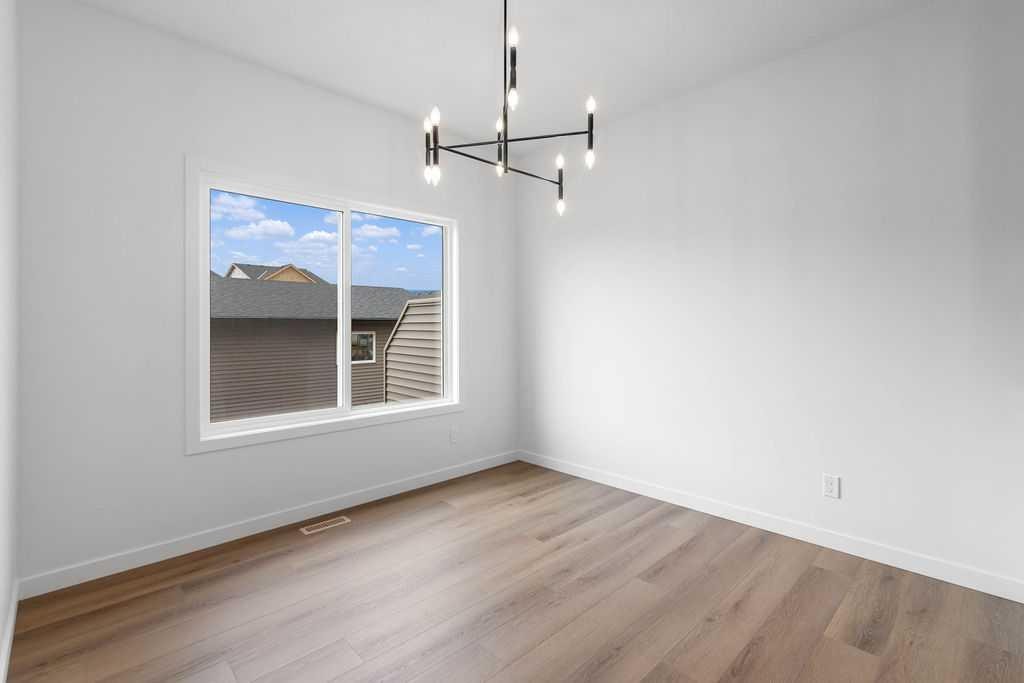 1029 Reynolds Crescent Sw, Airdrie, AB - Indoor Photo Showing Other Room