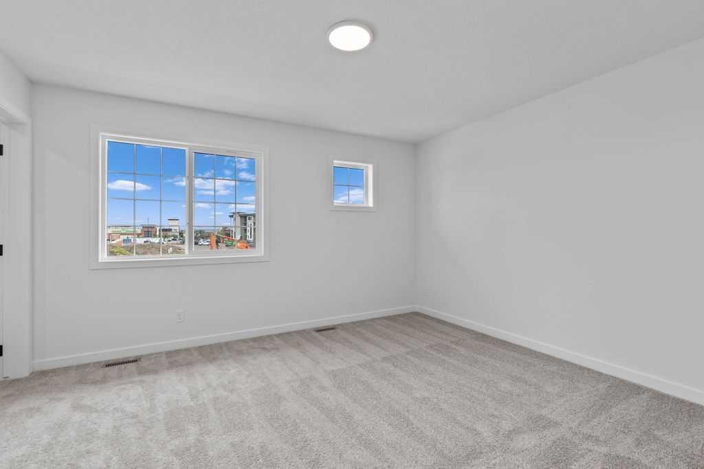 1029 Reynolds Crescent Sw, Airdrie, AB - Indoor Photo Showing Other Room