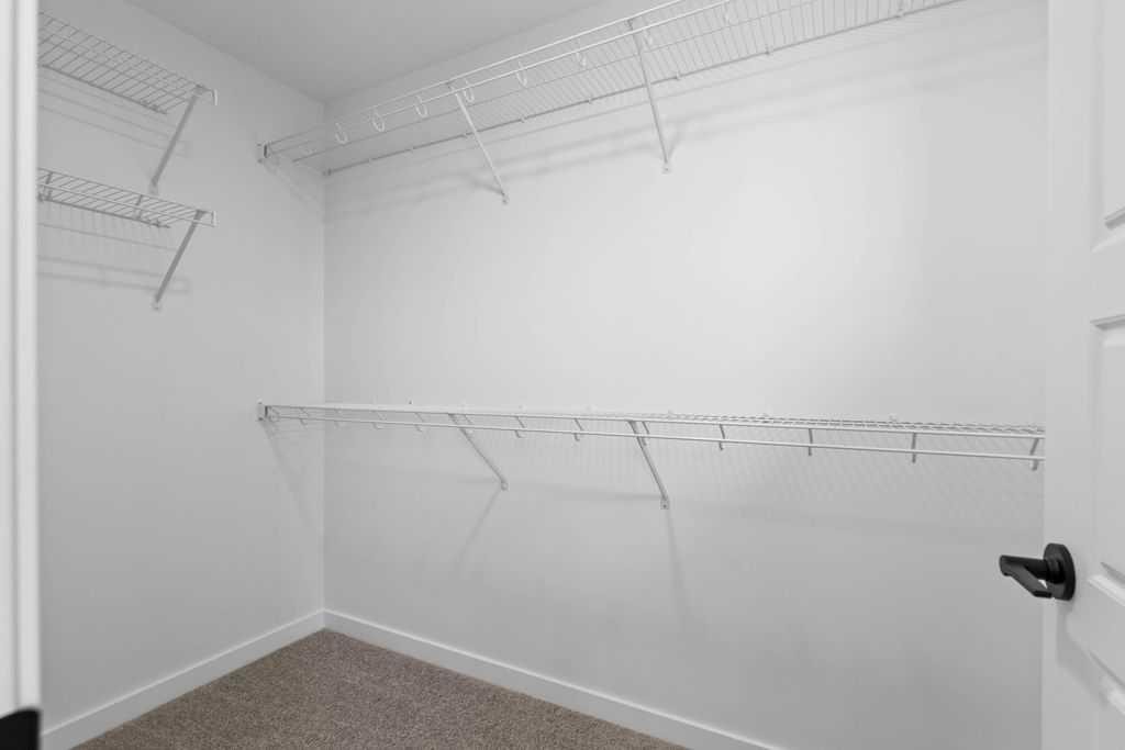 1029 Reynolds Crescent Sw, Airdrie, AB - Indoor With Storage