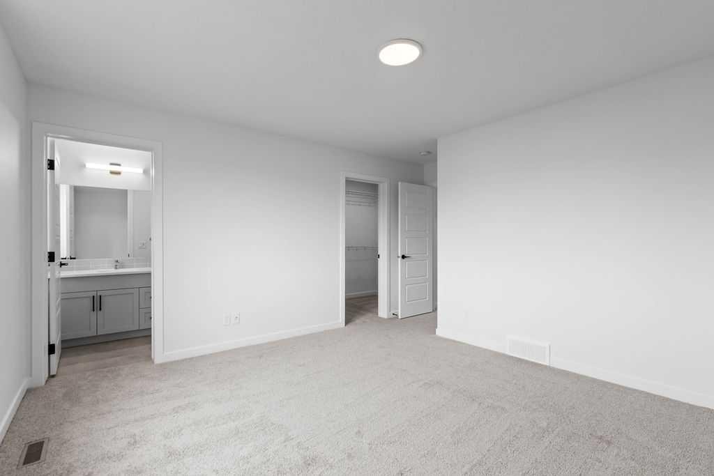 1029 Reynolds Crescent Sw, Airdrie, AB - Indoor Photo Showing Other Room