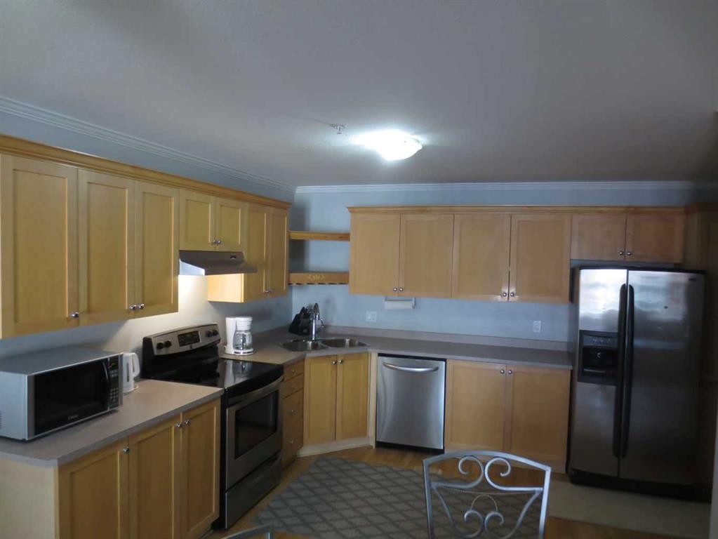 301-243 Gregoire Drive, Fort Mcmurray, AB - Indoor Photo Showing Kitchen With Double Sink