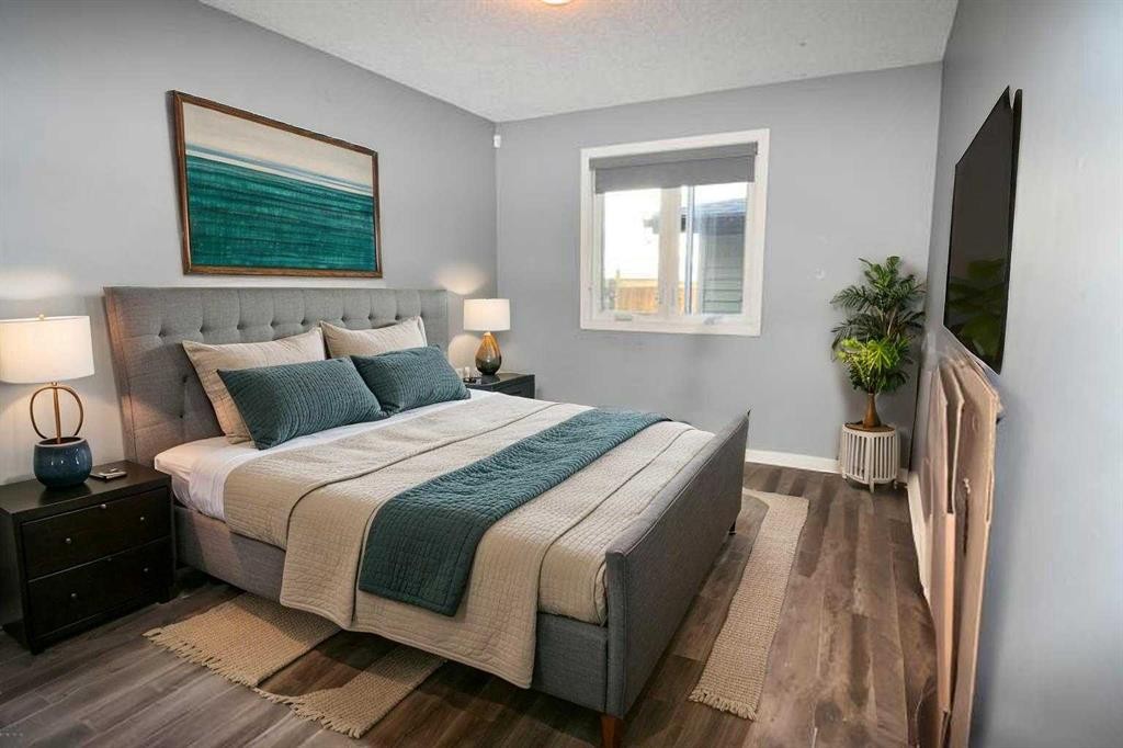 106 Eldorado Road Se, Airdrie, AB - Indoor Photo Showing Bedroom
