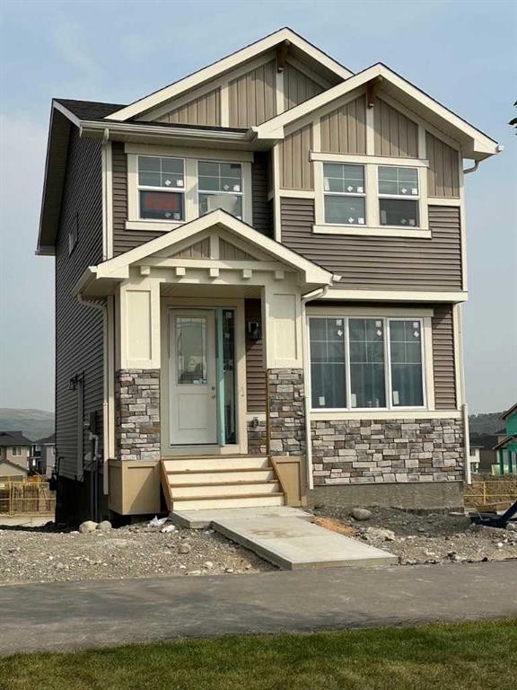 434 River Avenue, Cochrane, AB - Outdoor With Facade