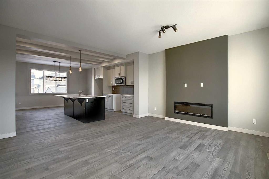 434 River Avenue, Cochrane, AB - Indoor Photo Showing Living Room With Fireplace
