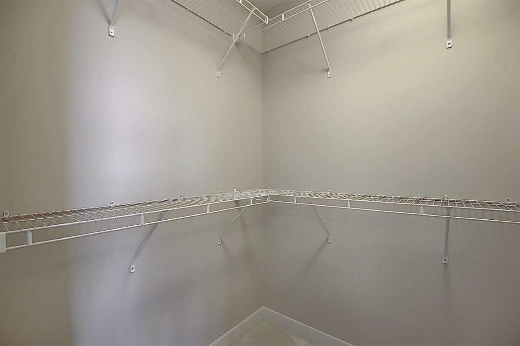 434 River Avenue, Cochrane, AB - Indoor With Storage