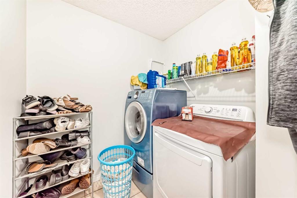 158 Panamount Drive Nw, Calgary, AB - Indoor Photo Showing Laundry Room