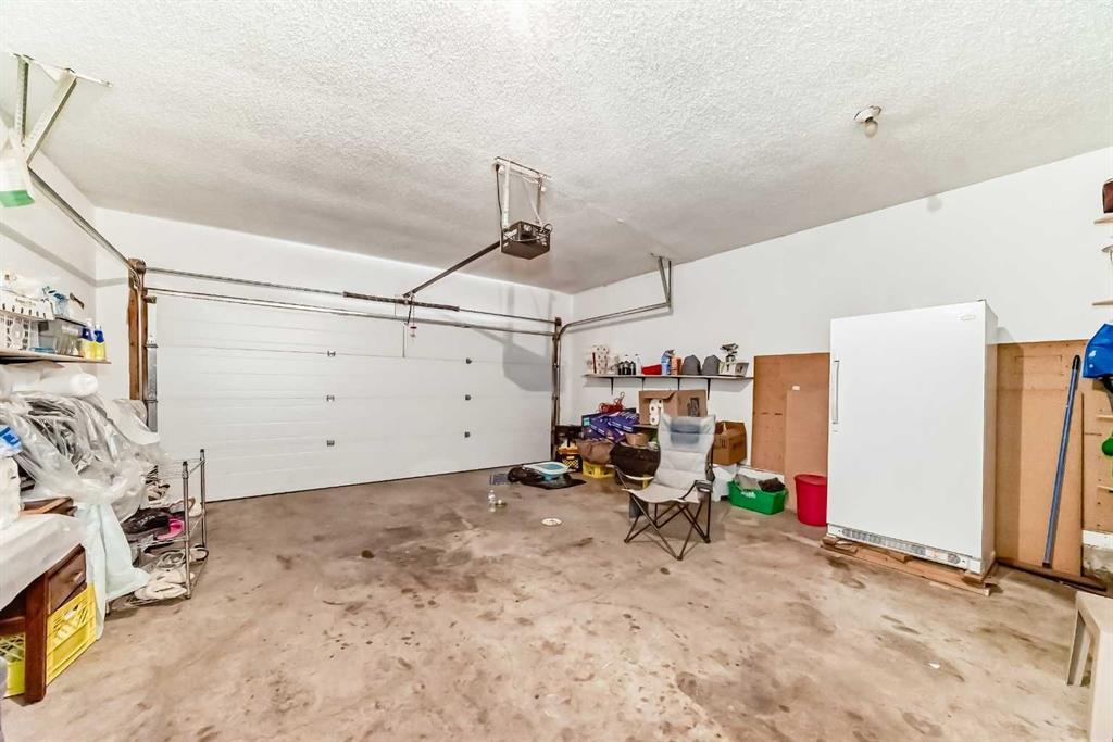 158 Panamount Drive Nw, Calgary, AB - Indoor Photo Showing Garage