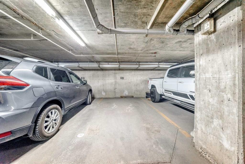 1204-2395 Eversyde Avenue Sw, Calgary, AB - Indoor Photo Showing Garage