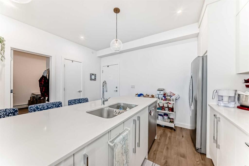 1614-60 Skyview Ranch Road Ne, Calgary, AB - Indoor Photo Showing Kitchen With Double Sink