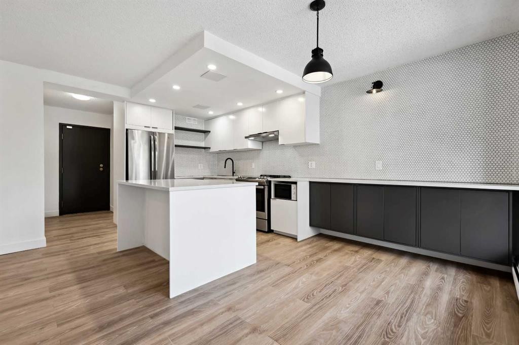 206-1414 5 Street Sw, Calgary, AB - Indoor Photo Showing Kitchen With Upgraded Kitchen