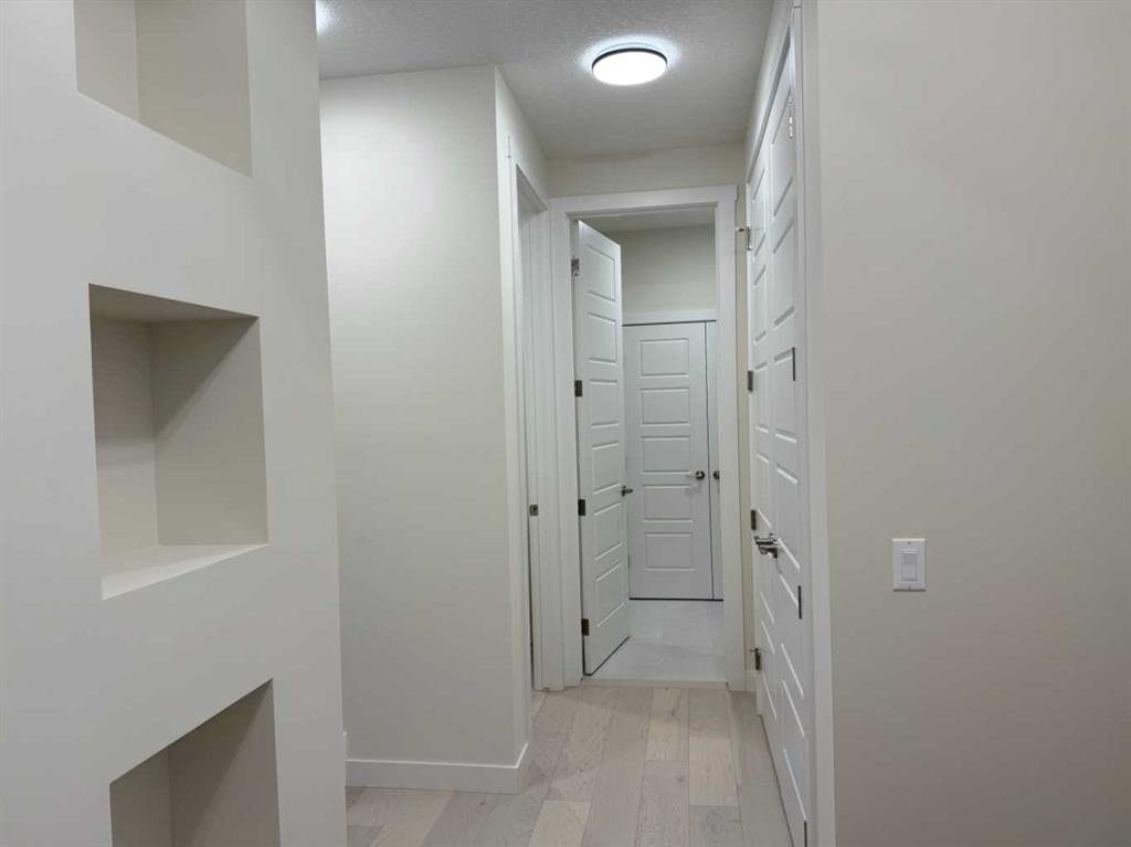 92 Sundown Crescent, Cochrane, AB - Indoor Photo Showing Other Room
