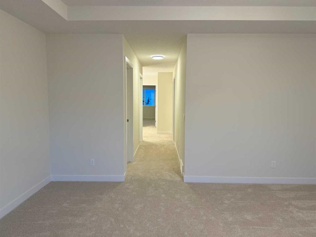 92 Sundown Crescent, Cochrane, AB - Indoor Photo Showing Other Room