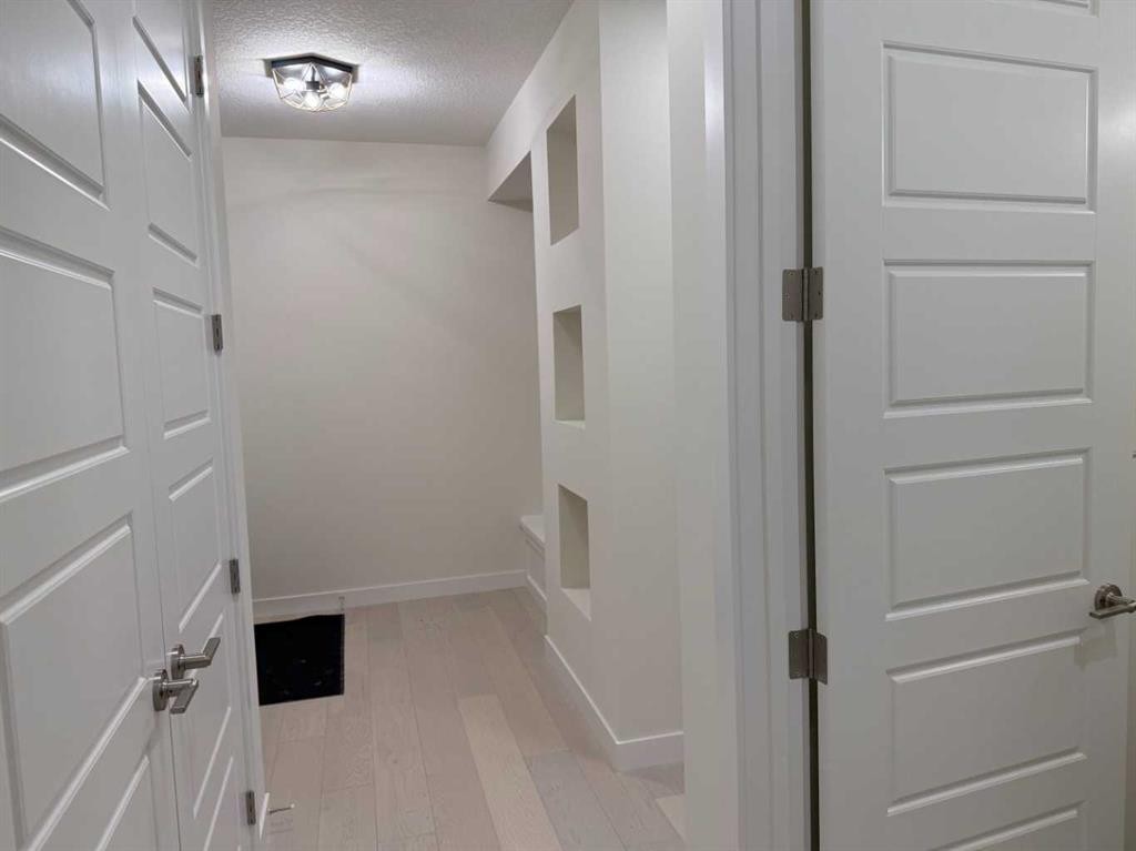 92 Sundown Crescent, Cochrane, AB - Indoor Photo Showing Other Room