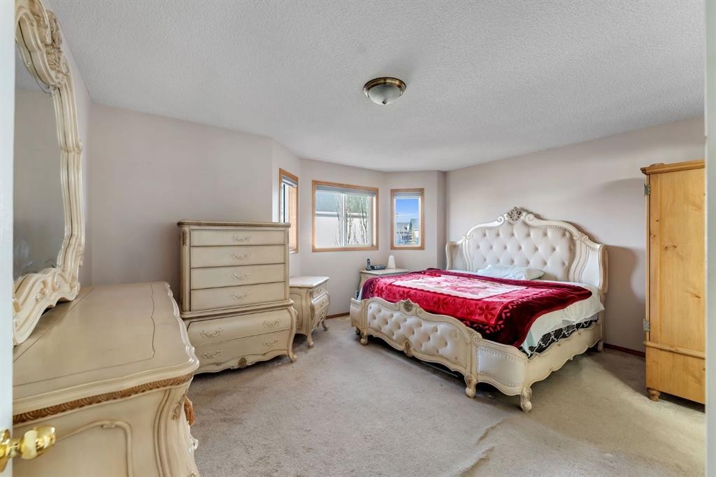 717 Coral Springs Boulevard Ne, Calgary, AB - Indoor Photo Showing Bedroom