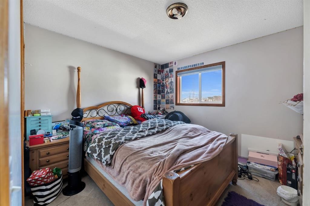 717 Coral Springs Boulevard Ne, Calgary, AB - Indoor Photo Showing Bedroom