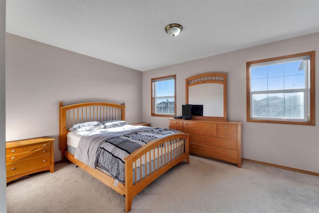 717 Coral Springs Boulevard Ne, Calgary, AB - Indoor Photo Showing Bedroom