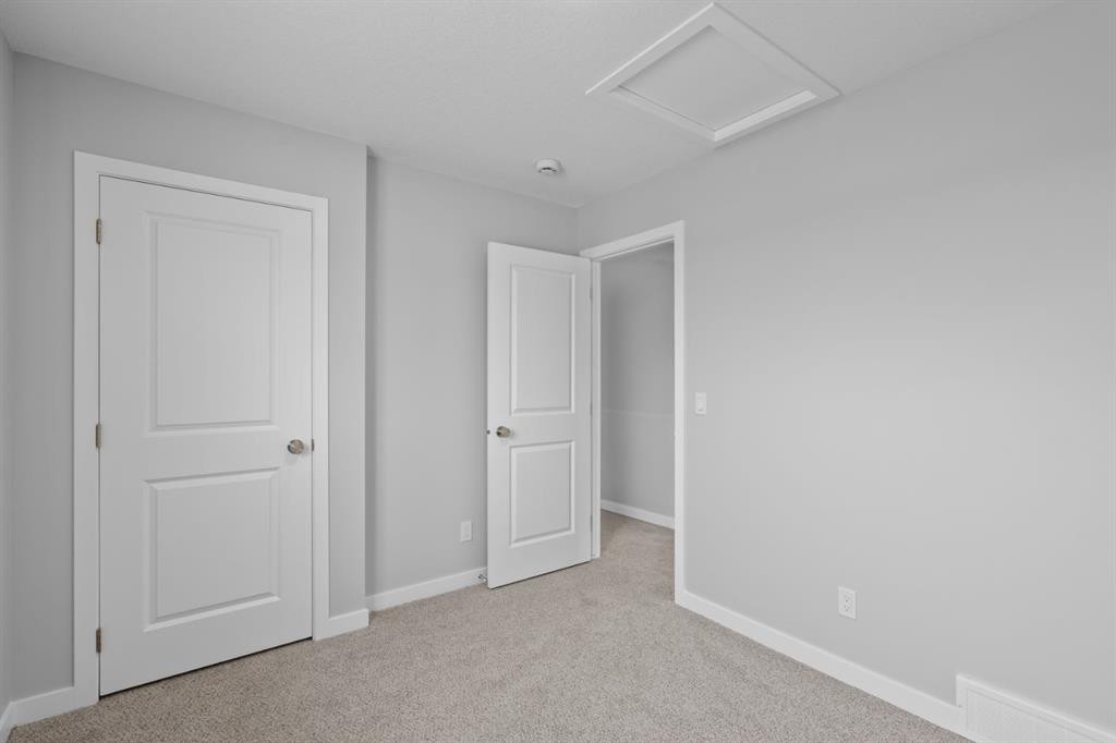 114 Lewiston Way Ne, Calgary, AB - Indoor Photo Showing Other Room