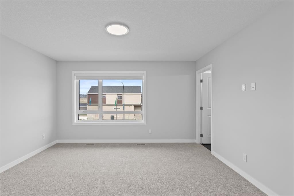 114 Lewiston Way Ne, Calgary, AB - Indoor Photo Showing Other Room