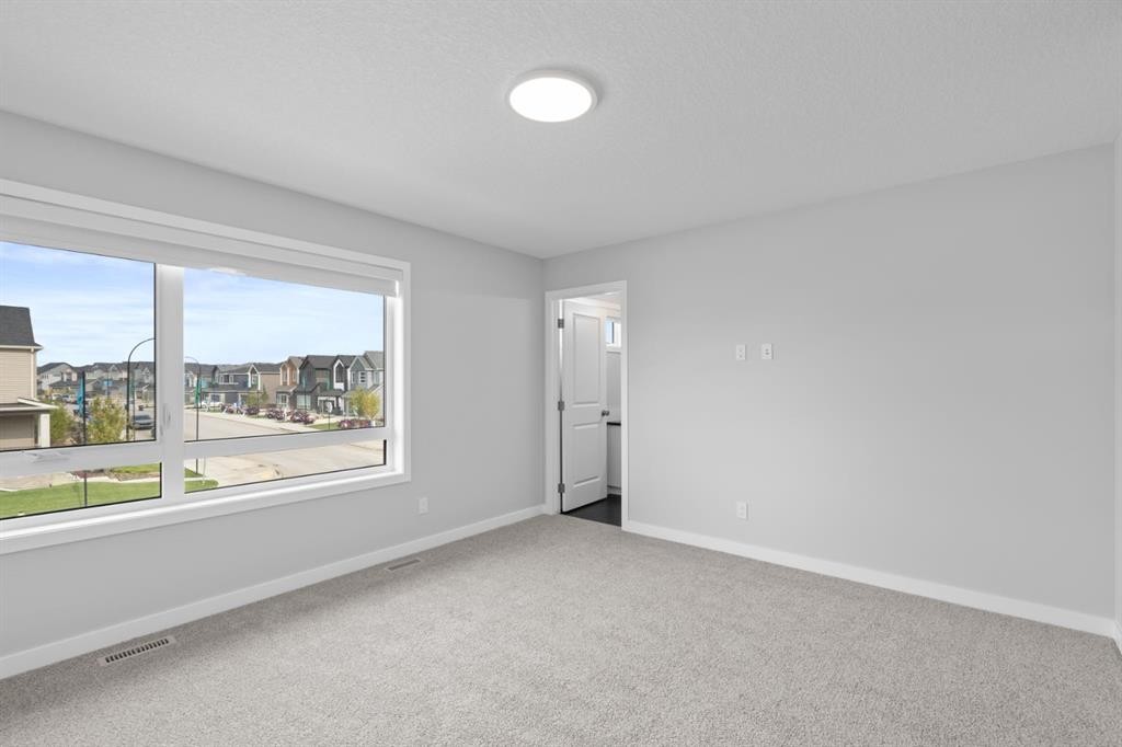 114 Lewiston Way Ne, Calgary, AB - Indoor Photo Showing Other Room