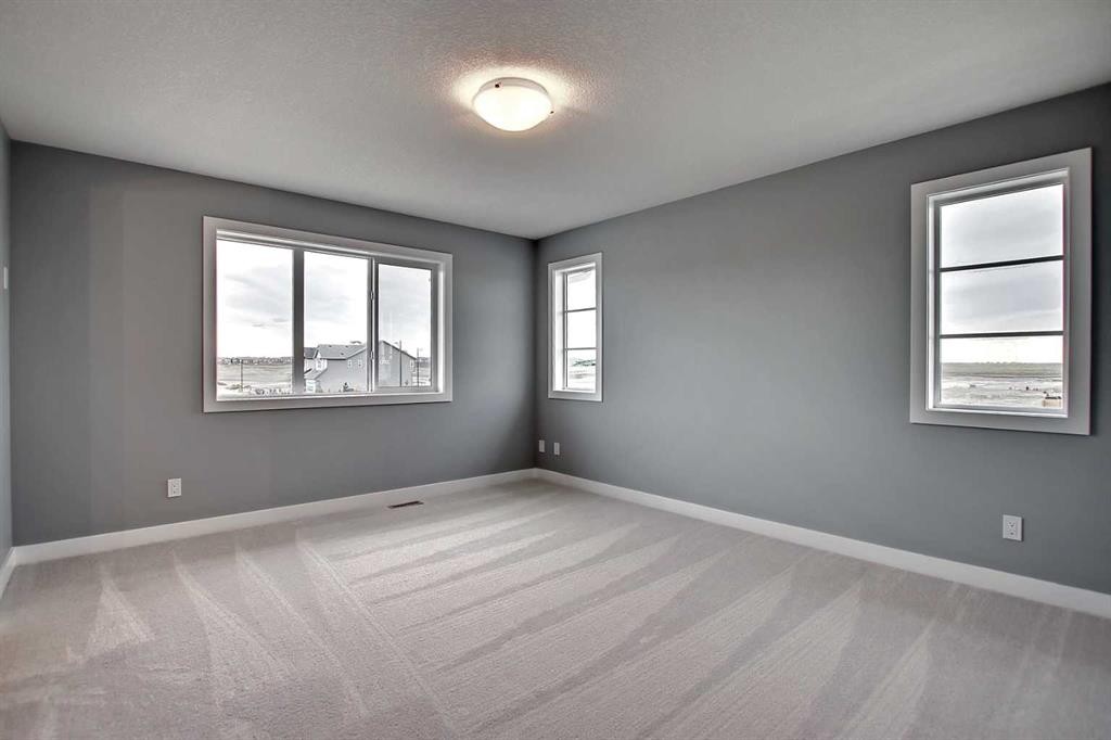 47 Agate Road, Cochrane, AB - Indoor Photo Showing Other Room