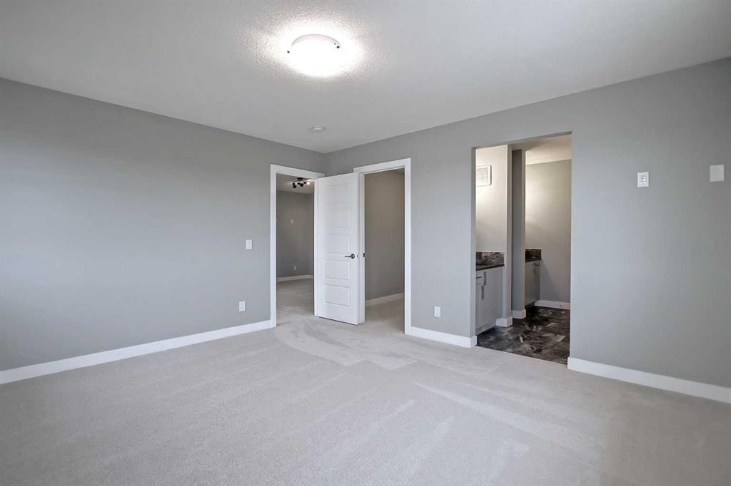 47 Agate Road, Cochrane, AB - Indoor Photo Showing Other Room