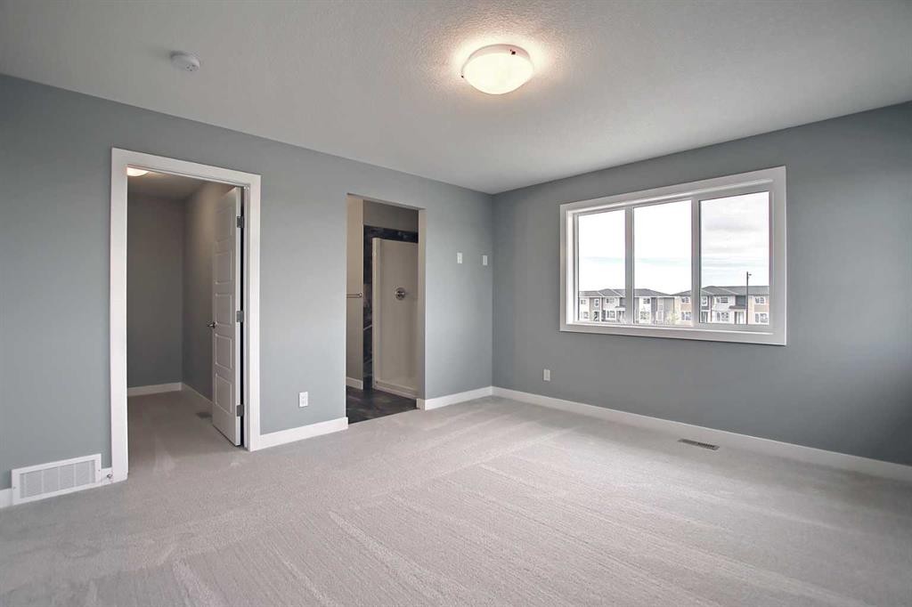 47 Agate Road, Cochrane, AB - Indoor Photo Showing Other Room