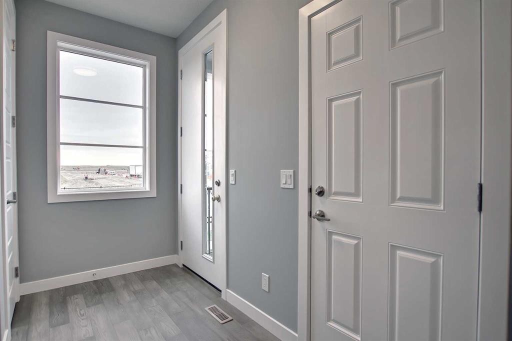 47 Agate Road, Cochrane, AB - Indoor Photo Showing Other Room