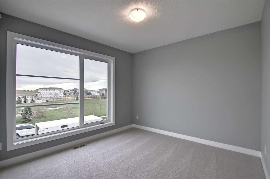 47 Agate Road, Cochrane, AB - Indoor Photo Showing Other Room