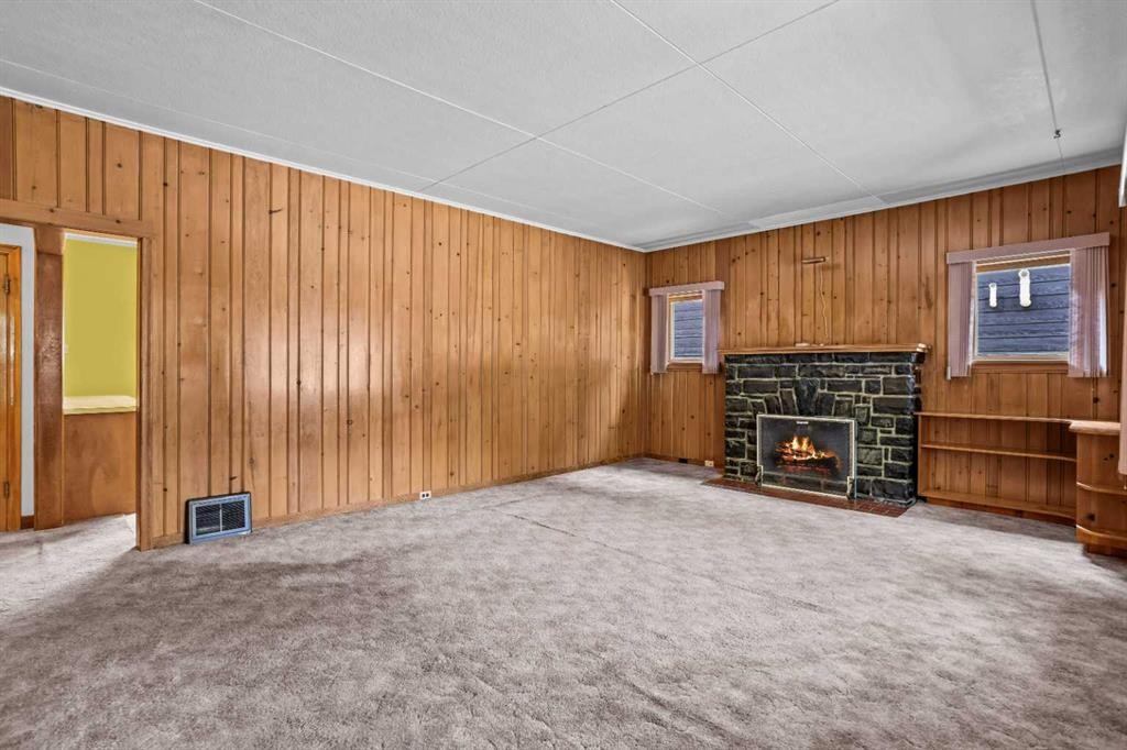 404 Otter Street, Banff, AB - Indoor With Fireplace