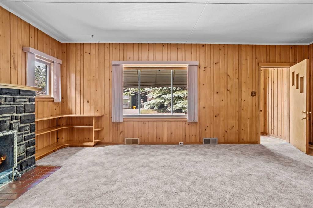 404 Otter Street, Banff, AB - Indoor With Fireplace