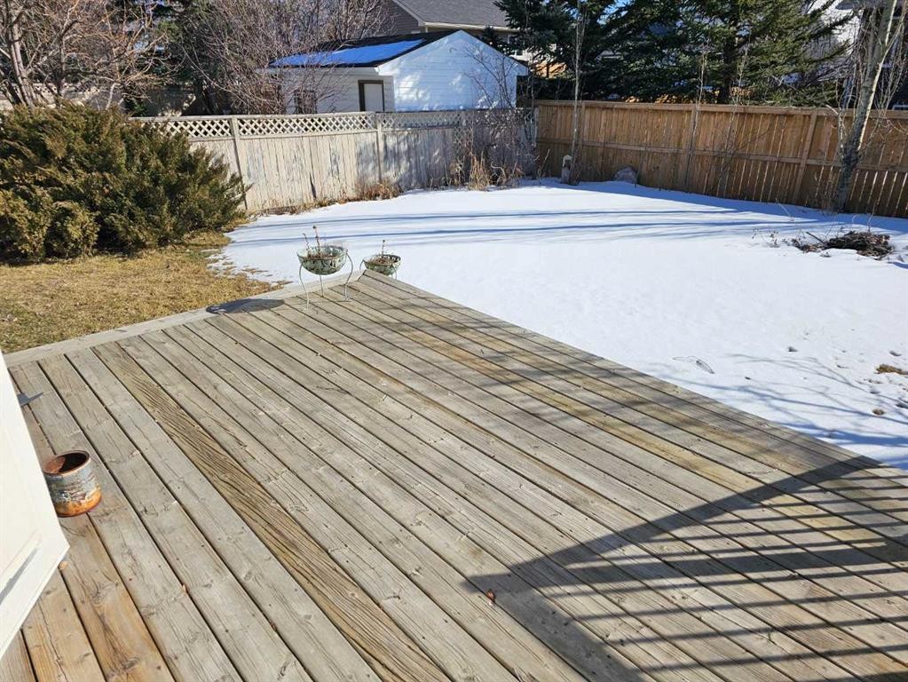 302 Meadowbrook Bay Se, Airdrie, AB - Outdoor With Deck Patio Veranda