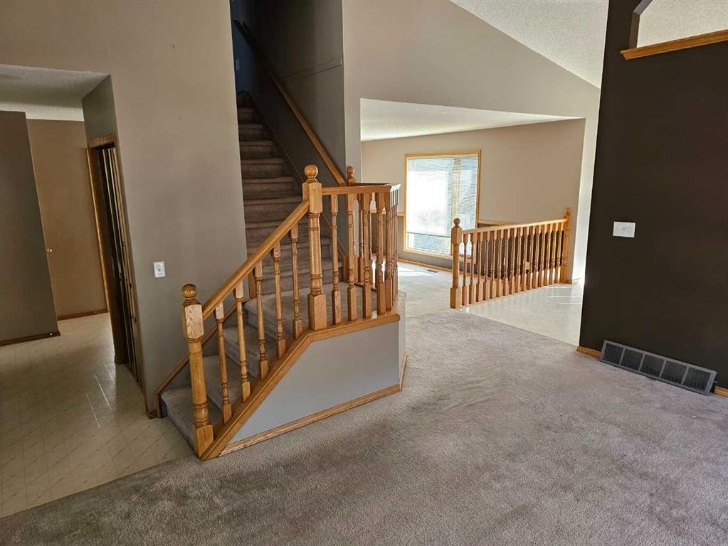 302 Meadowbrook Bay Se, Airdrie, AB - Indoor Photo Showing Other Room