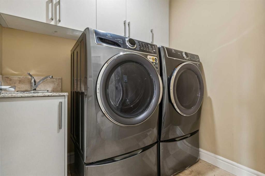 34 Taralake Cape Ne, Calgary, AB - Indoor Photo Showing Laundry Room
