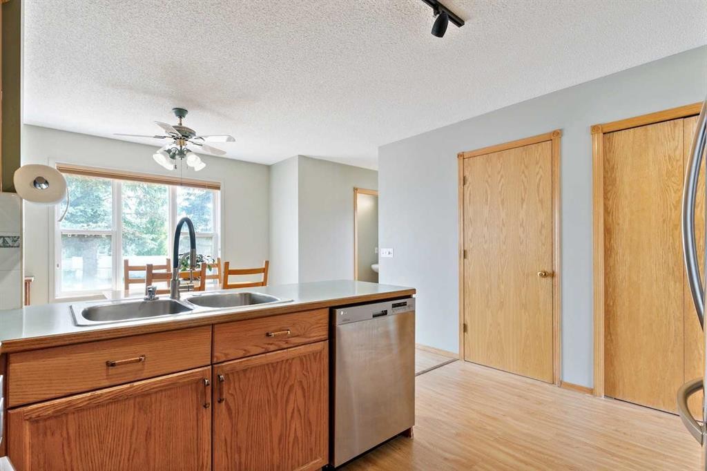 7 Covewood Park Ne, Calgary, AB - Indoor Photo Showing Kitchen With Double Sink
