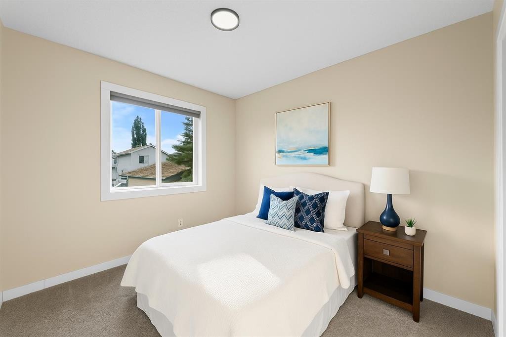 7136 Laguna Way Ne, Calgary, AB - Indoor Photo Showing Bedroom
