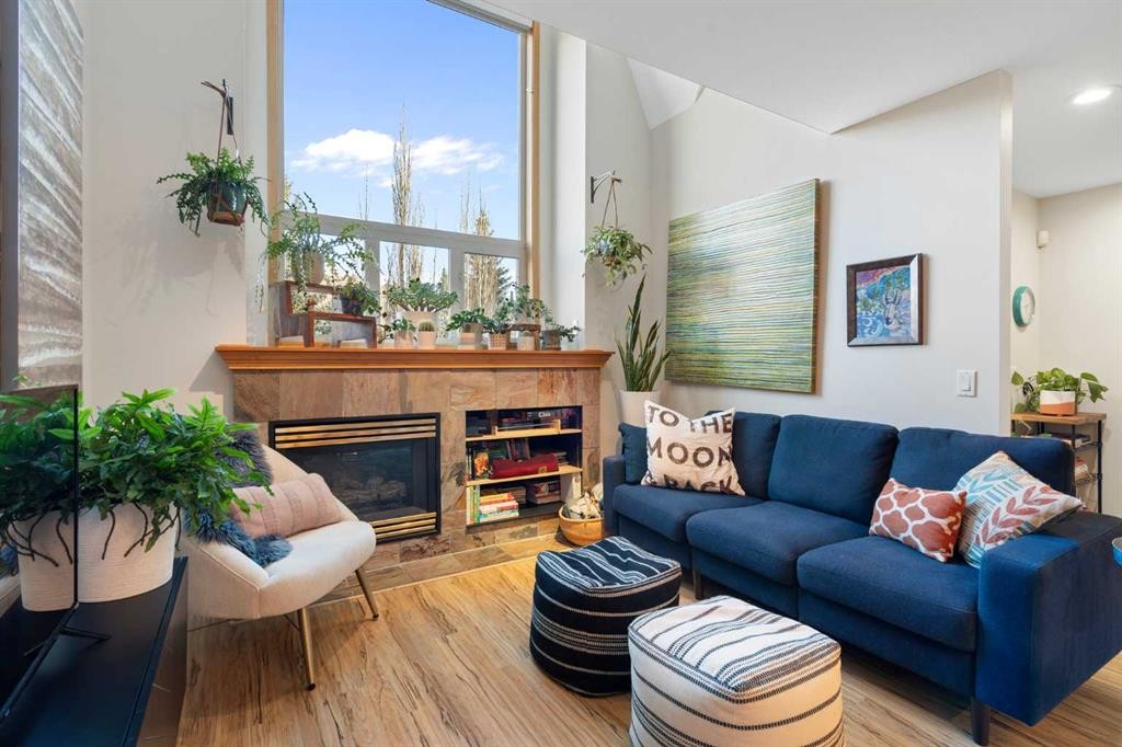 2-601 4Th Street, Canmore, AB - Indoor Photo Showing Living Room With Fireplace