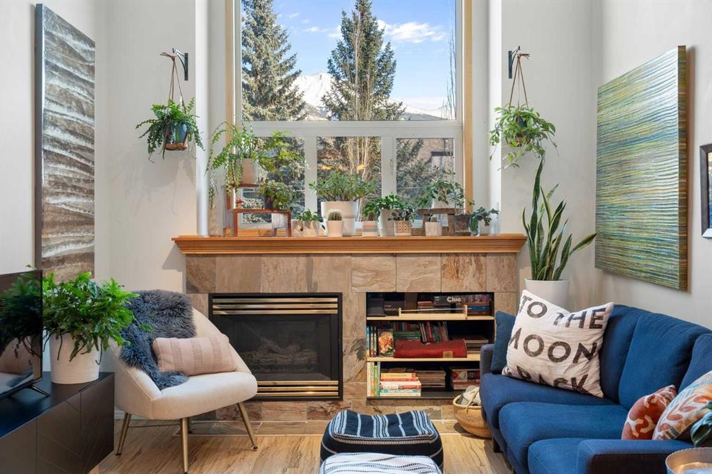 2-601 4Th Street, Canmore, AB - Indoor Photo Showing Living Room With Fireplace