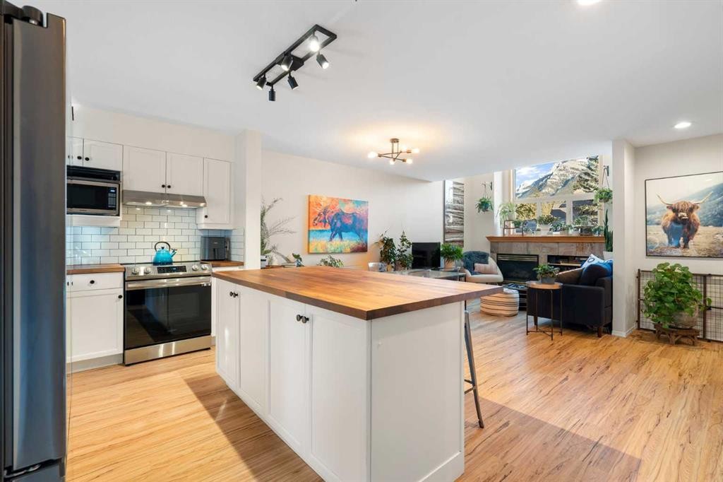 2-601 4Th Street, Canmore, AB - Indoor Photo Showing Kitchen With Double Sink