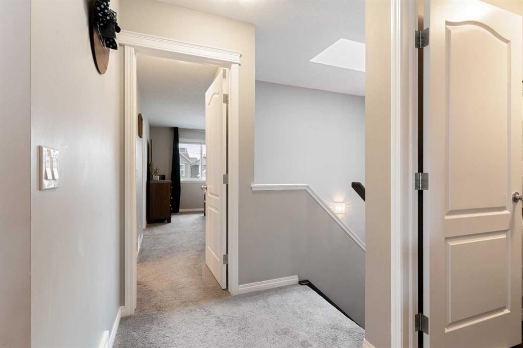 95 Evansborough Common Nw, Calgary, AB - Indoor Photo Showing Other Room