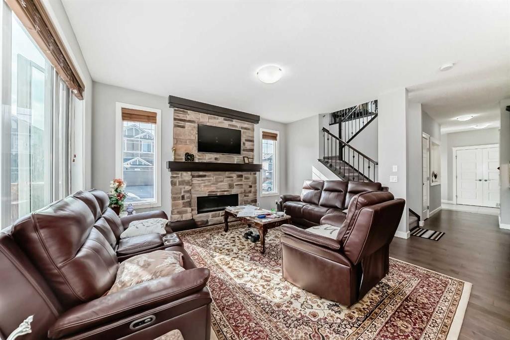 107 Nolancrest Rise Nw, Calgary, AB - Indoor Photo Showing Living Room With Fireplace