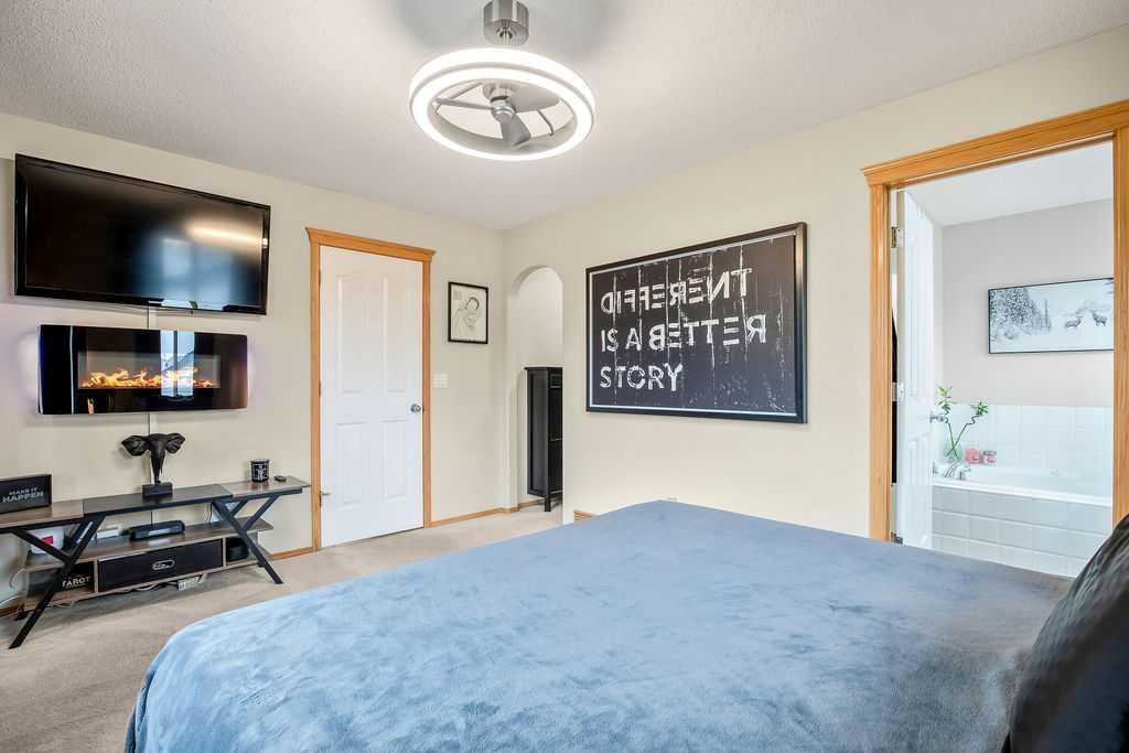 128 Cramond Crescent Se, Calgary, AB - Indoor Photo Showing Bedroom
