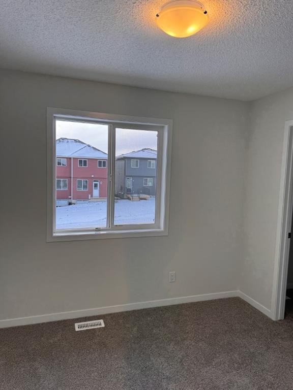 21 Setonvista Gate Se, Calgary, AB - Indoor Photo Showing Other Room