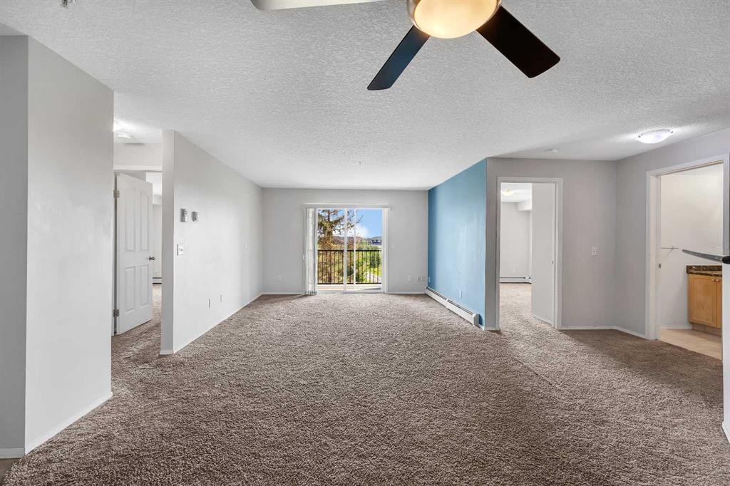 6307-304 Mackenzie Way Sw, Airdrie, AB - Indoor Photo Showing Other Room