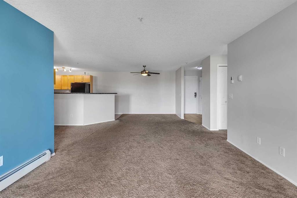 6307-304 Mackenzie Way Sw, Airdrie, AB - Indoor Photo Showing Other Room