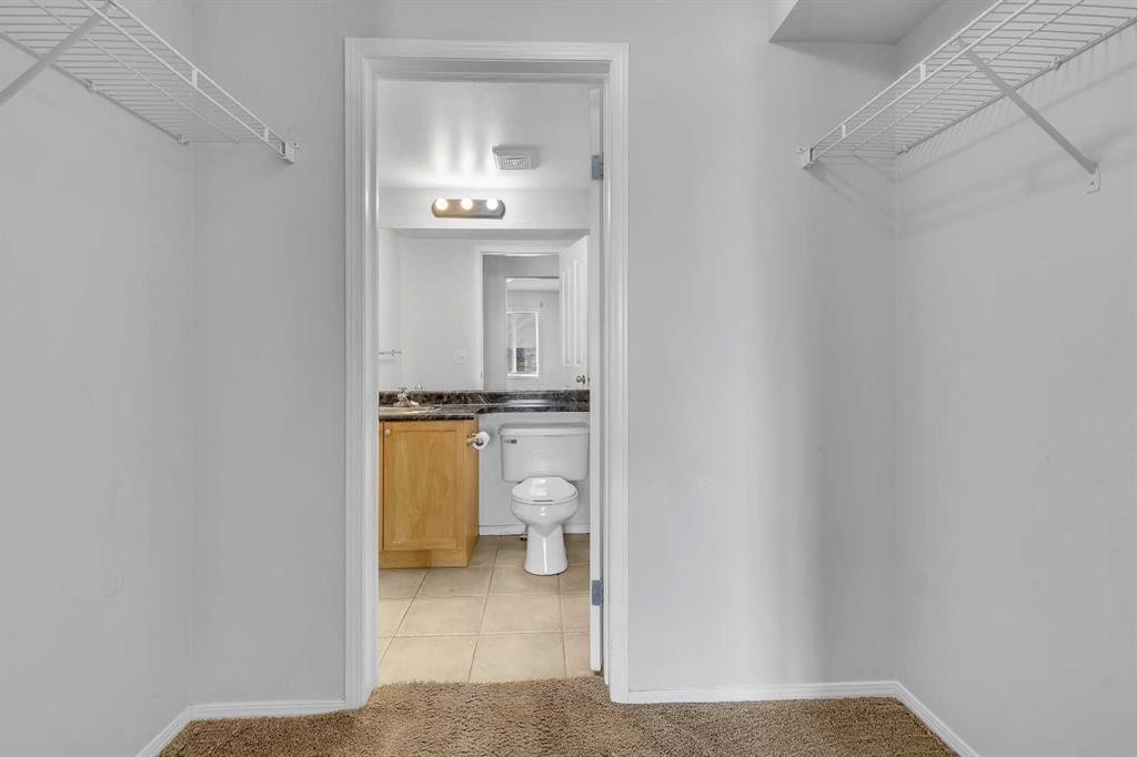 6307-304 Mackenzie Way Sw, Airdrie, AB - Indoor Photo Showing Other Room
