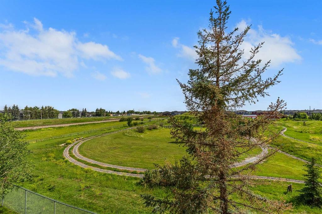 6307-304 Mackenzie Way Sw, Airdrie, AB - Outdoor With View